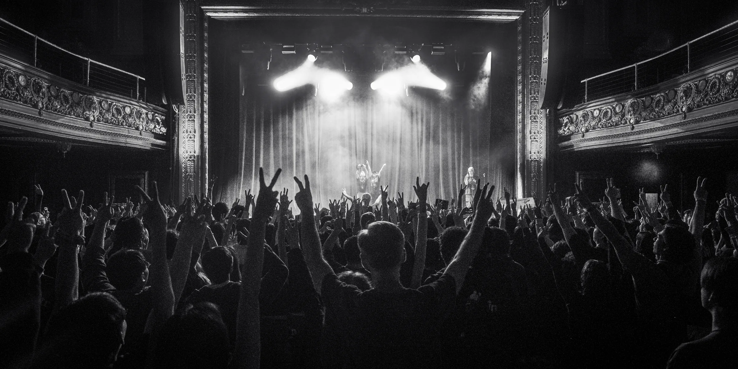 ASH ISLAND and the San Francisco audience in a black-and-white venue view