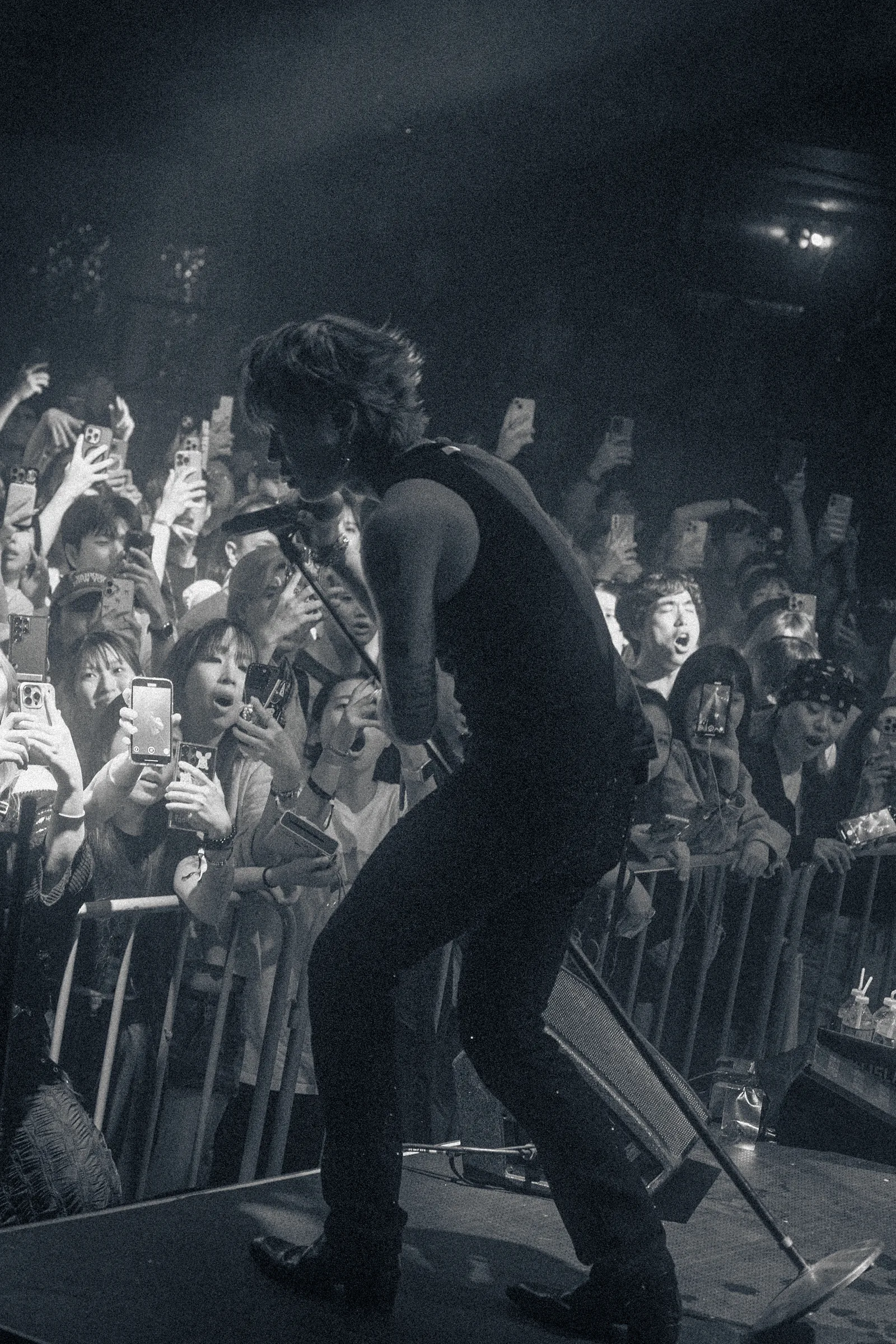 ASH ISLAND performing with fans at the Vancouver barricade